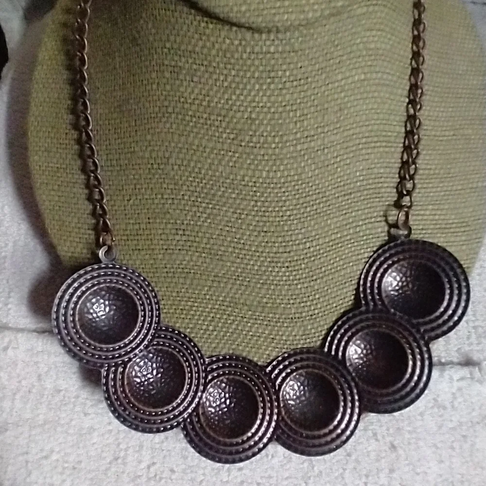 Dark copper color statement runway necklace